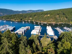 an aerial view of a marina with boats in the water at Maple Rise Guesthouse in Duncan