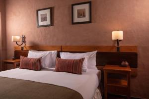 Krevet ili kreveti u jedinici u okviru objekta Hotel Pascual Andino