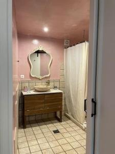 a bathroom with a sink and a mirror at Sphinx Apartments - A in Chios +26 photos