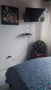 Postel nebo postele na pokoji v ubytování Comfort La Española