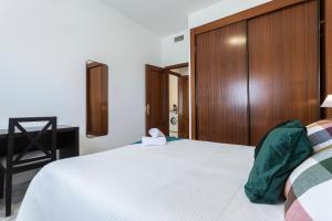 Postel nebo postele na pokoji v ubytování Apartamento Moderno LuxSevilla Bormujos