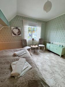 Giường trong phòng chung tại Villa Utsikten Eggen
