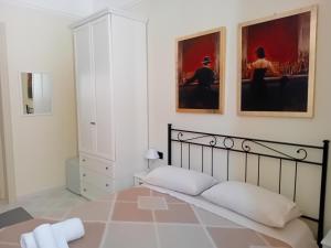 Posteľ alebo postele v izbe v ubytovaní Palazzo Castellano