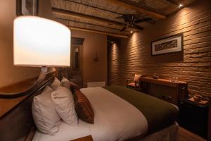 Krevet ili kreveti u jedinici u okviru objekta Hotel Pascual Andino