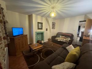 Et opholdsområde på Holly Farm Cottage