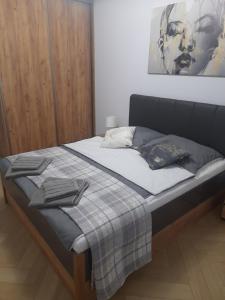 Postel nebo postele na pokoji v ubytování Apartament Tatarska Niezapominajka