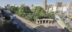 an aerial view of a city street with cars at MIRAFLORES CITY HOTEL in Lima