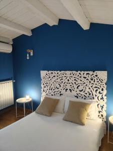 Postel nebo postele na pokoji v ubytování MaGia b&b Corato