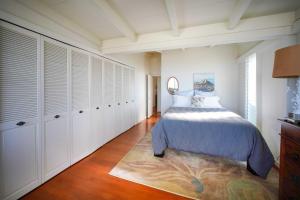 En eller flere senge i et værelse på Ocean and Skyline Views Honolulu Retreat