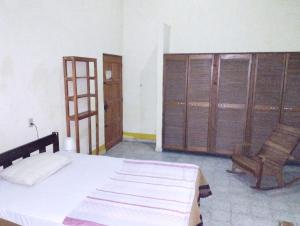 Voodi või voodid majutusasutuse Hostal Juan Lindo toas