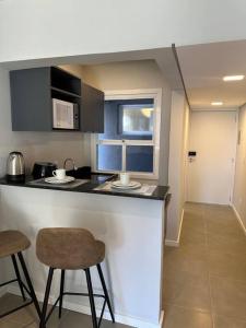 Η κουζίνα ή μικρή κουζίνα στο Studio novo todo mobiliado CENTRO da Capital ao lado do Hospital Santa Casa