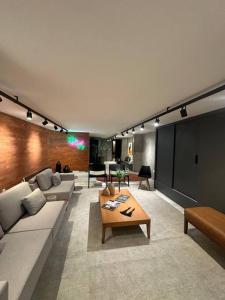 Χώρος καθιστικού στο Studio novo todo mobiliado CENTRO da Capital ao lado do Hospital Santa Casa