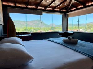 Espaço Verano - Suítes客房内的一张或多张床位