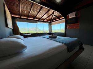 Espaço Verano - Suítes客房内的一张或多张床位