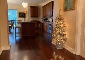 a christmas tree in the middle of a kitchen at Paradise Gem in Naples
