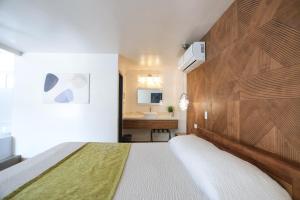 Postel nebo postele na pokoji v ubytování Hotel Aqua Rio