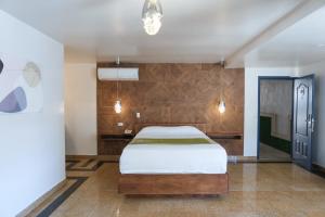 Postel nebo postele na pokoji v ubytování Hotel Aqua Rio