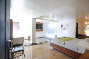 Postel nebo postele na pokoji v ubytování Hotel Aqua Rio