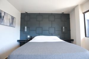 Postel nebo postele na pokoji v ubytování Hotel Aqua Rio