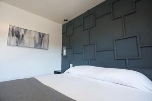 Postel nebo postele na pokoji v ubytování Hotel Aqua Rio
