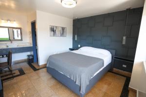 Postel nebo postele na pokoji v ubytování Hotel Aqua Rio