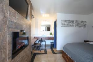 Kuchyň nebo kuchyňský kout v ubytování Hotel Aqua Rio