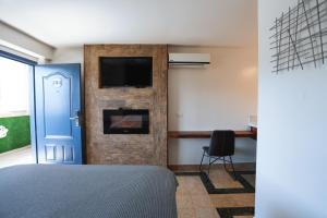 TV a/nebo společenská místnost v ubytování Hotel Aqua Rio