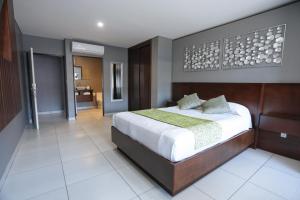 Postel nebo postele na pokoji v ubytování Hotel Aqua Rio