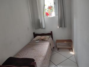 Postel nebo postele na pokoji v ubytování Minha casa pousada + 1 fotografie