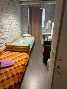 Postel nebo postele na pokoji v ubytování Süda Hostel