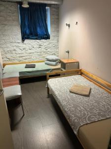 Postel nebo postele na pokoji v ubytování Süda Hostel