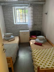 Postel nebo postele na pokoji v ubytování Süda Hostel