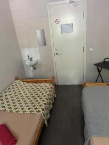 Postel nebo postele na pokoji v ubytování Süda Hostel