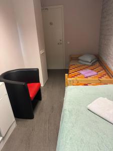 Postel nebo postele na pokoji v ubytování Süda Hostel
