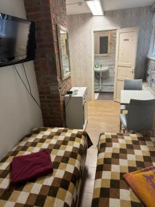 TV a/nebo společenská místnost v ubytování Süda Hostel