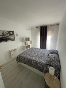 Posteľ alebo postele v izbe v ubytovaní Apartamento en el Puerto de Llança!
