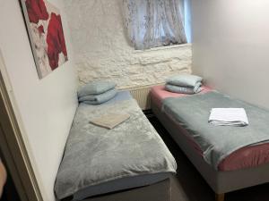 Postel nebo postele na pokoji v ubytování Süda Hostel