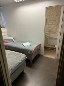 Postel nebo postele na pokoji v ubytování Süda Hostel