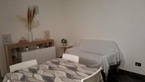 Postel nebo postele na pokoji v ubytování Casa gialla