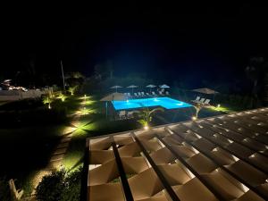 a view of a building at night with lights at SUNSEA - Enjoy Your Family in Capo Vaticano