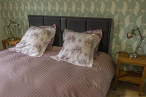 Postel nebo postele na pokoji v ubytování L'Appartement