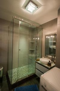 Koupelna v ubytování L'Appartement