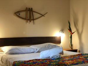 Postel nebo postele na pokoji v ubytování Alecrim Hostel e Pousada