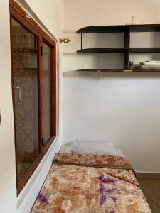 Katil atau katil-katil dalam bilik di Dar Shams miniHostel