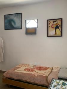 Katil atau katil-katil dalam bilik di Dar Shams miniHostel
