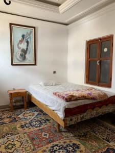 Katil atau katil-katil dalam bilik di Dar Shams miniHostel