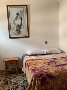 Katil atau katil-katil dalam bilik di Dar Shams miniHostel