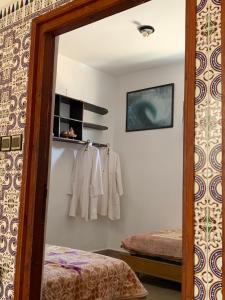 Katil atau katil-katil dalam bilik di Dar Shams miniHostel