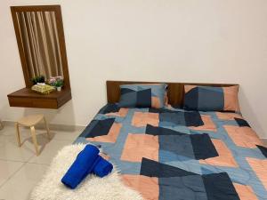Ampang 6-8 pax in Ampang Point客房内的一张或多张床位