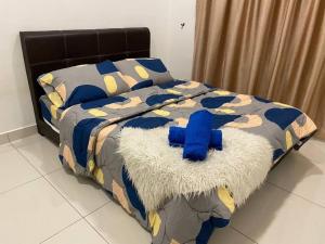 Ampang 6-8 pax in Ampang Point客房内的一张或多张床位